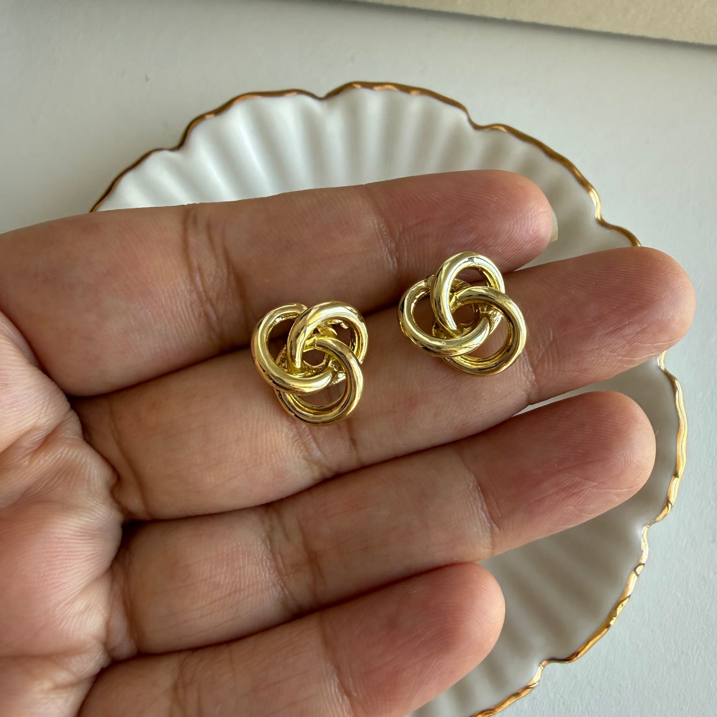 Gold spiral stud earrings
