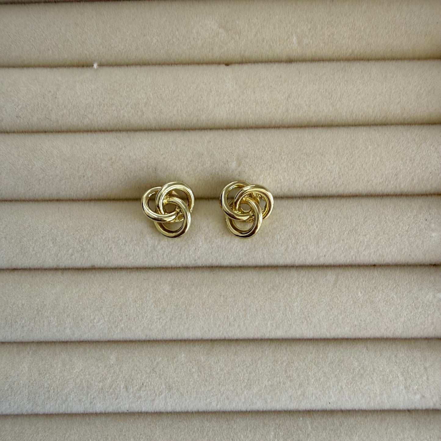 Gold spiral stud earrings