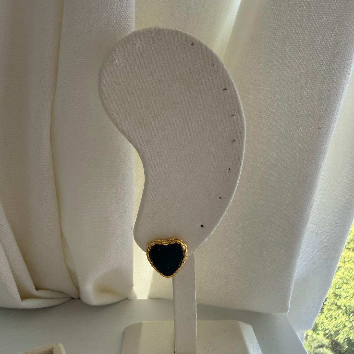 Black Heart Stud Earrings with Gold Detailing