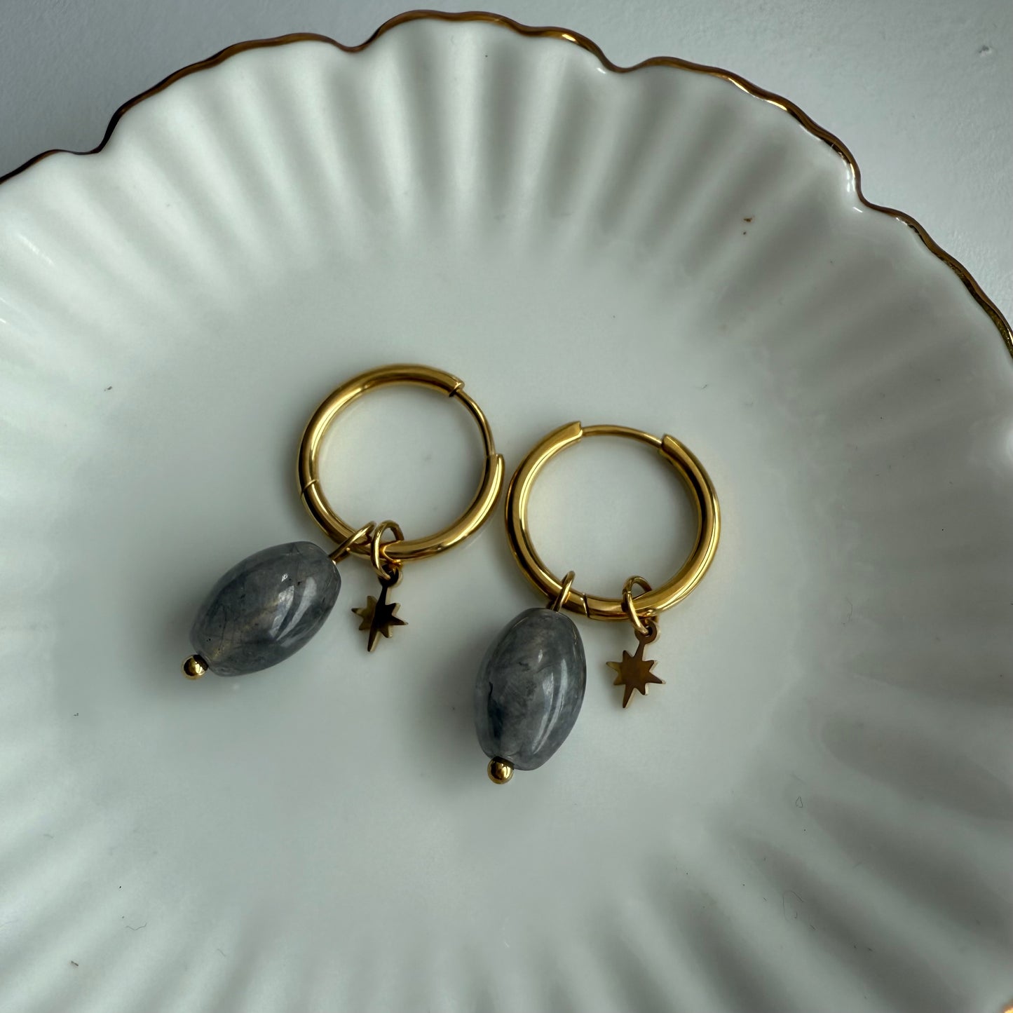 Eclipse star Huggies earrings