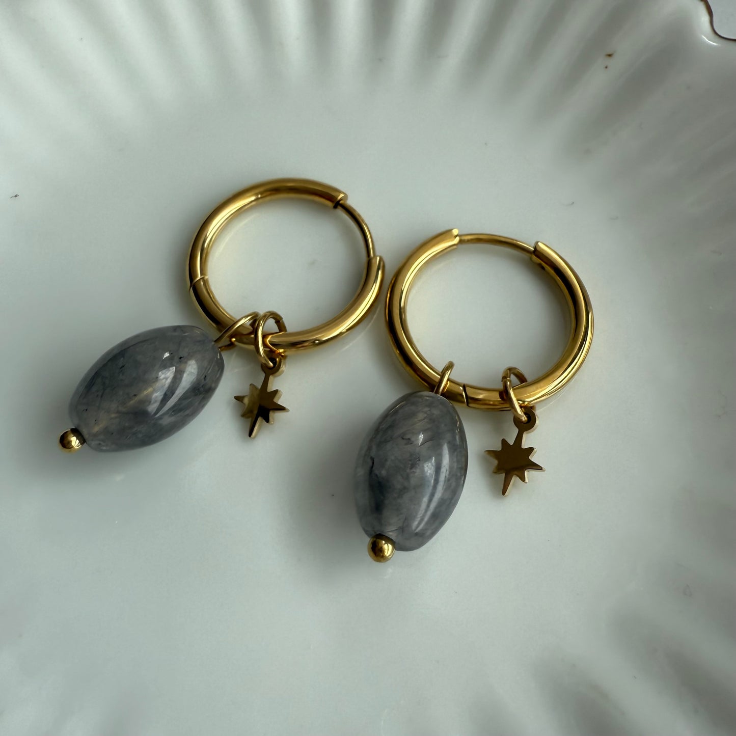 Eclipse star Huggies earrings