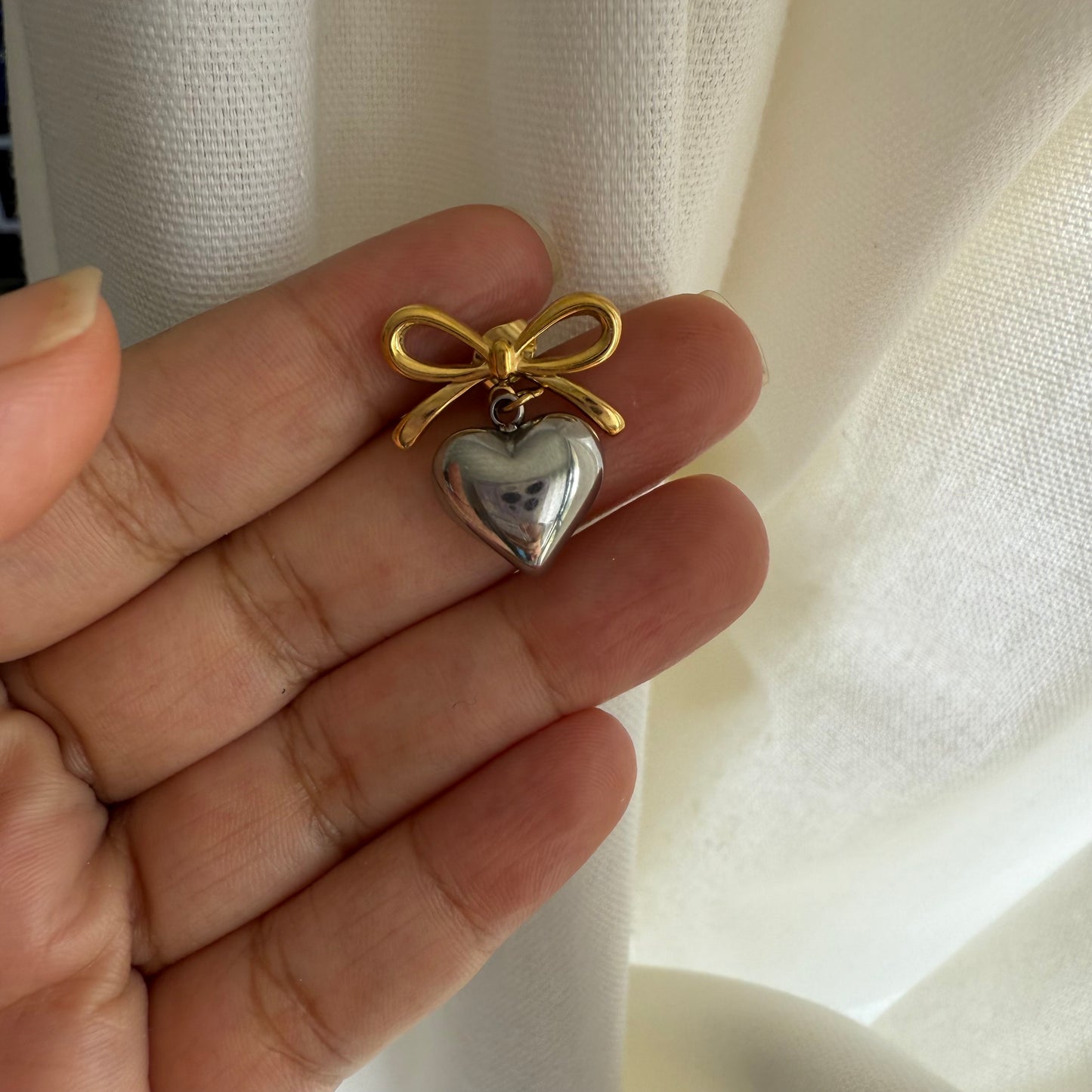 Bow heart earrings
