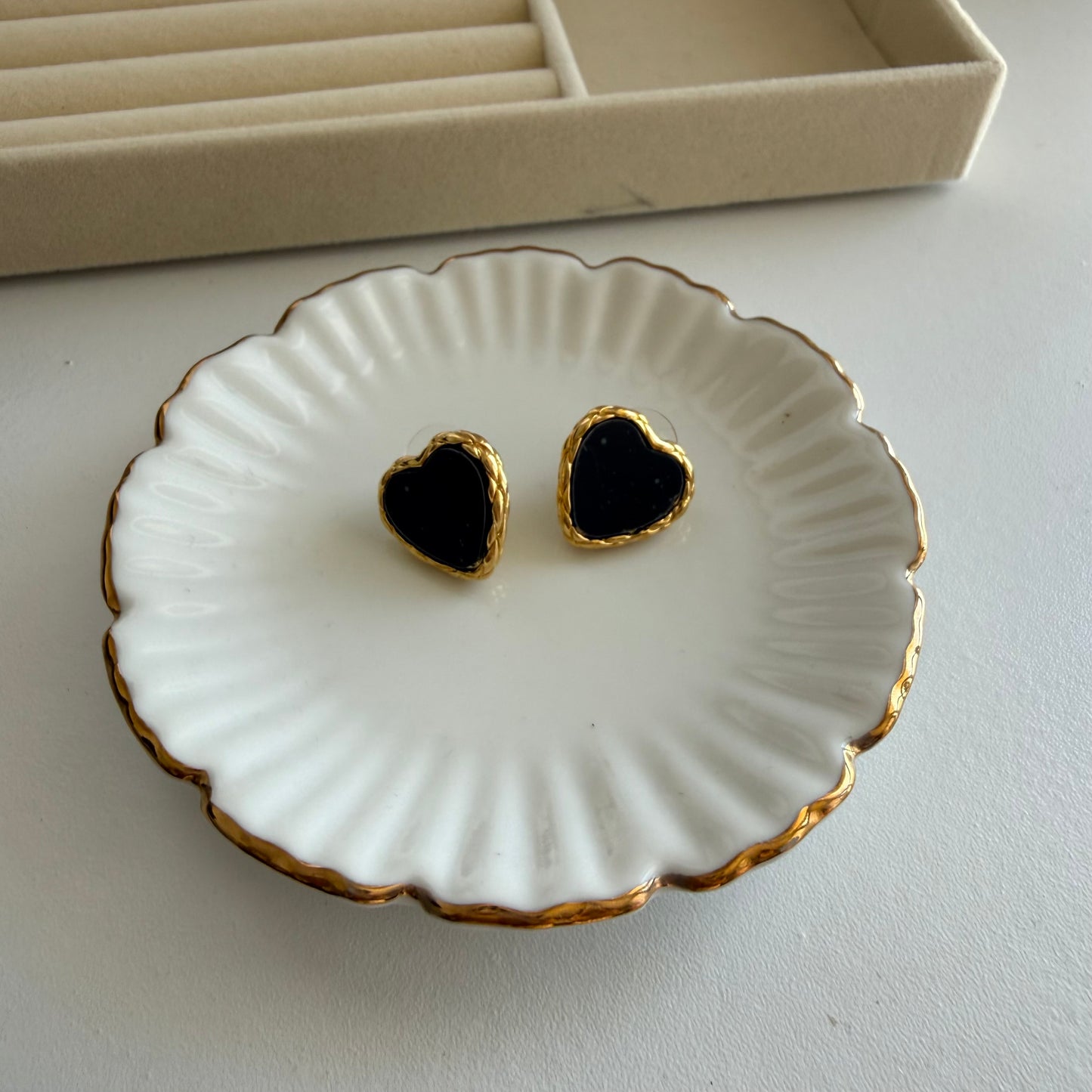Black Heart Stud Earrings with Gold Detailing