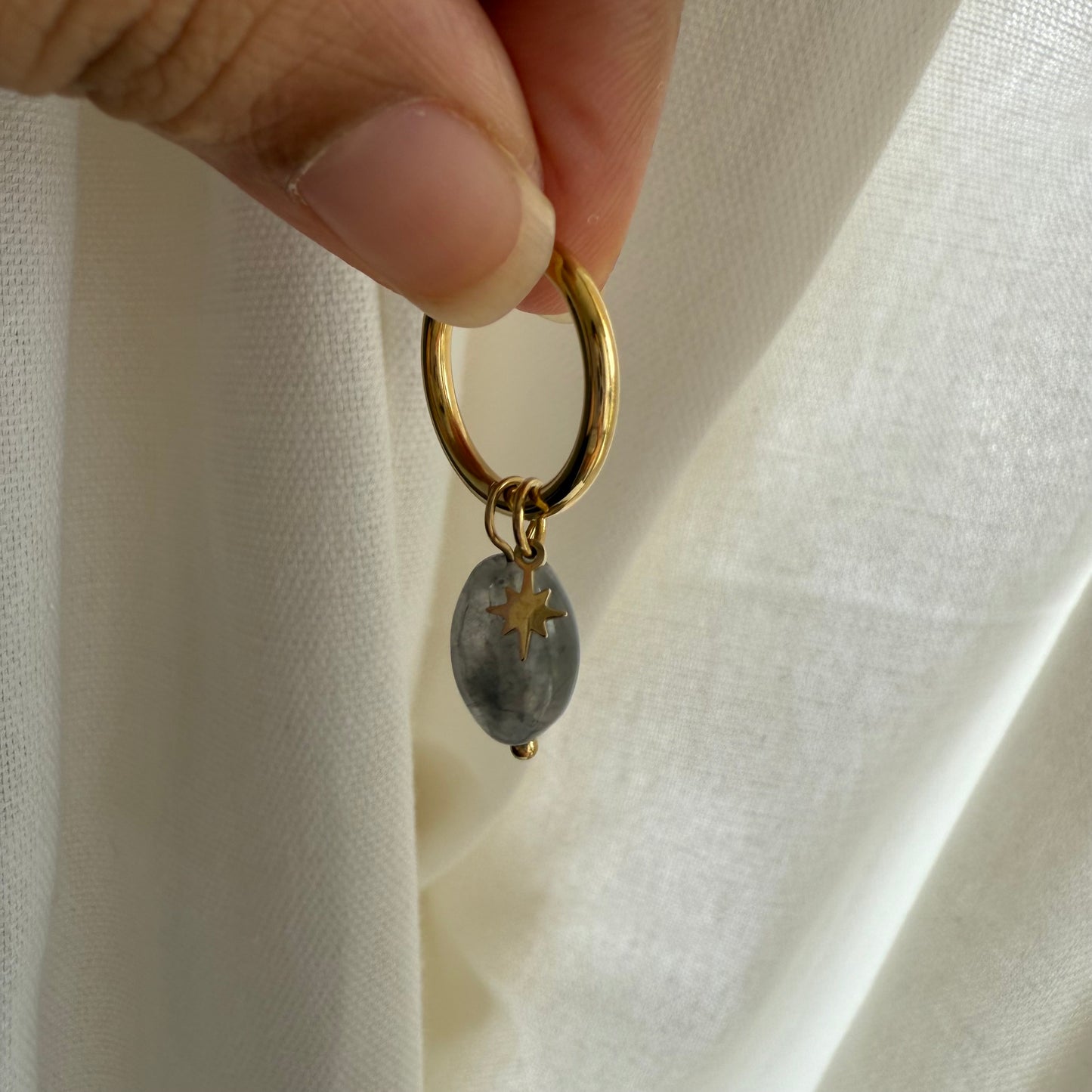 Eclipse star Huggies earrings